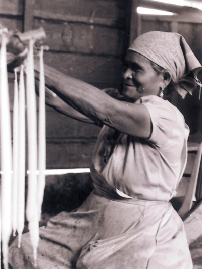 Zapatista woman making candles -Mariana Mora